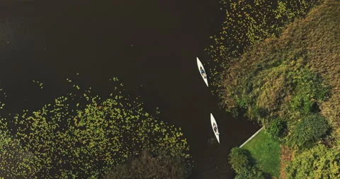 Drone top shot of two white canoes Stock Footage 221319283