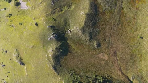 Drone top view of alpine meadows and rocky terrain in Bosnia mountains Video stock 318657512