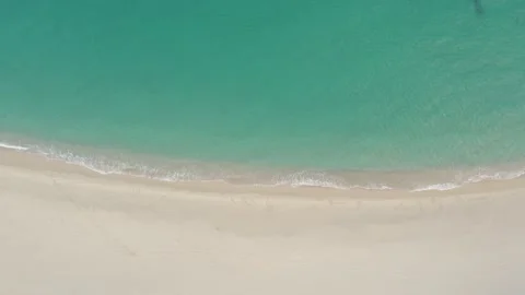 Drone top view point of view of empty beach in slow motion Stock Footage 227005868