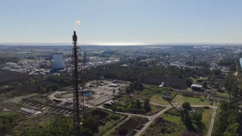 Drone top view of refinery with flare stack flame and storage tanks Video stock 316214021