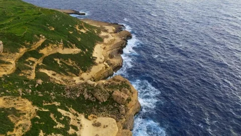 Drone top view of rocks and waves, sea. Mediterranean sea, Malta Stock Footage 305711410