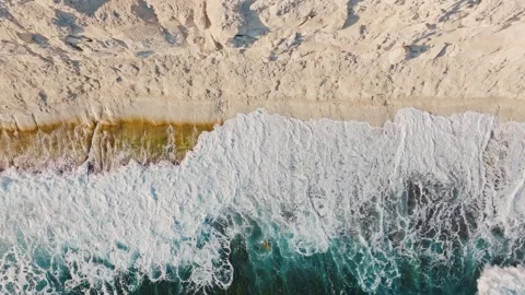 Drone top view of sea waves, white rocks, coast route. Mediterranean sea Vídeos de archivo 327155355