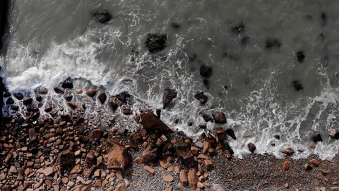 Drone top view storm sea waves crashing on rocks Stock-Footage 105207577