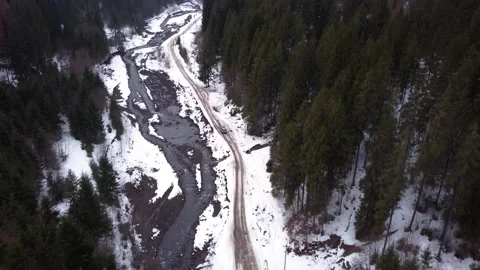 Drone top view SUV driving on a mountain road. winter. panorama Stock Footage 168929054