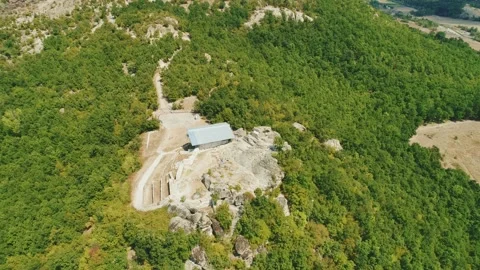 Drone top view Thracian sanctuary, located near Tatul, Bulgaria, Carved grave  Видео 167724932