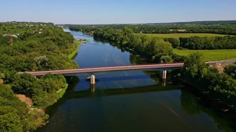 Drone top view of the Vienne River with Pont aval de Chinon bridge crossing Stock Footage 315677866