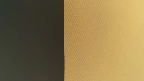 Drone topdown Sarykum lowland desert largest Caucasus sand dune barkhan Dagestan Stock Footage 150991653