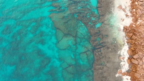 Drone topshot of perfect beach with turquoise water on Seychelles Stock Footage 87039174