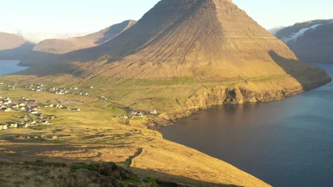 Drone Towards Mount Malinsfjall Over Vidareidi Village Stock Footage 133577592