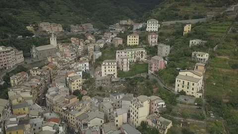 Drone | Town in the Hills | Push through Valley (No Color Grade) Stock Footage 106824448