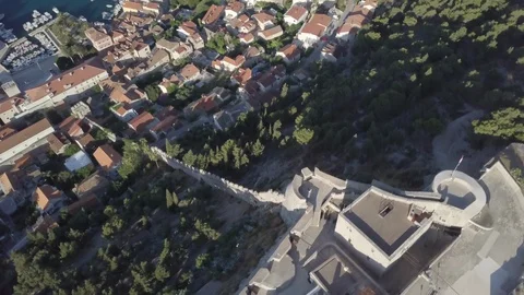 DRONE TRACK OVER CASTLE AND LOOKS DOWN CASTLE WALL 4K CINEMATIC Stock Footage 113296696