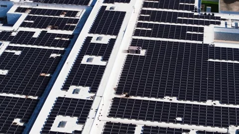 Drone Tracking Across Solar Covered Data Center Roofs Stock Footage 336401003