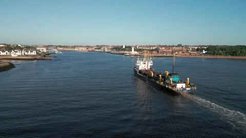 Drone tracking and circling dredging ship UKD Marlin on River Tyne Stock Footage 315030022