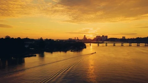 Drone tracking boat in a river Stock Footage 92733539