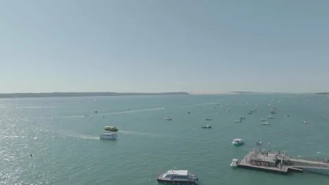 Drone tracking excursion boat leaving Cap Ferret, France Stock Footage 333107464