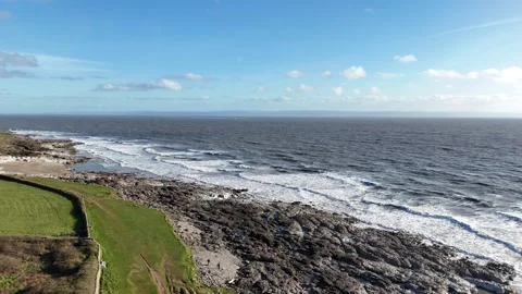 Drone Tracking From Green Coast Toward Ocean Waves, Wales UK 4K Vidéo 334071292