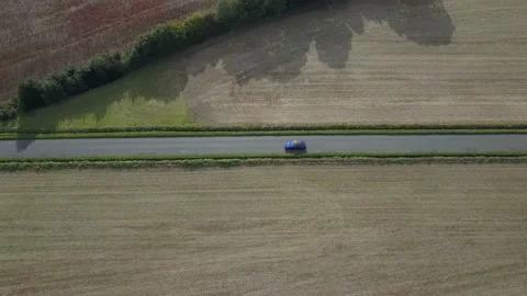 Drone tracking a moving car Stock Footage 147514937