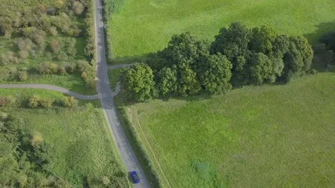 Drone tracking a moving car Stock Footage 147515122