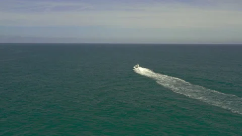 Drone tracking over the Mediterranean Sea passing a fishing/sailing boat Stock-Footage 150406322