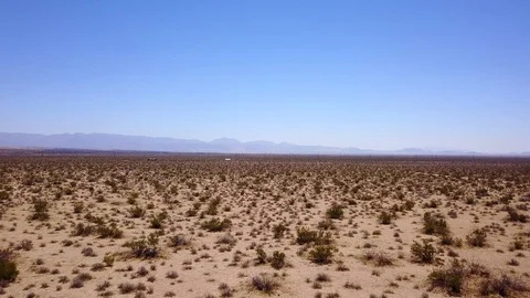 Drone tracking over mojave desert barren landscape Stock-Footage 92826822
