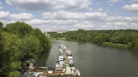 Drone tracking over the river and following it down the pass. 스톡 동영상 151160958