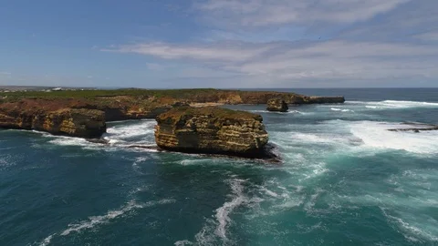 Drone tracking over the rocky coastline of Peterborough, Victoria, Australia. Stock Footage 87874905