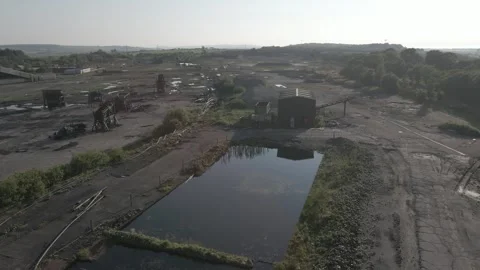 Drone Tracking Shot of Abandoned Coal Conveyor and Industrial Buildings Stock Footage 339075548