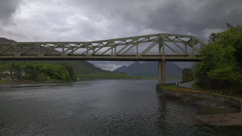 Drone tracking shot alongside the Ballachulish Bridge spanning Loch Linne Stock-Footage 335680612