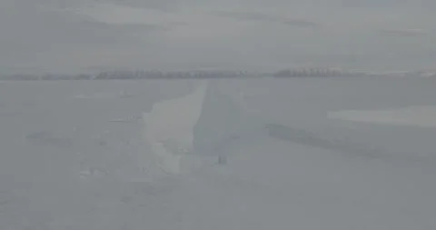 Drone Tracking Shot of Arctic Ice Crack, 4K Stock Footage 314403746
