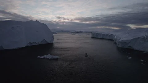 Drone Tracking Shot Between Icebergs, 4K Stock Footage 314403053