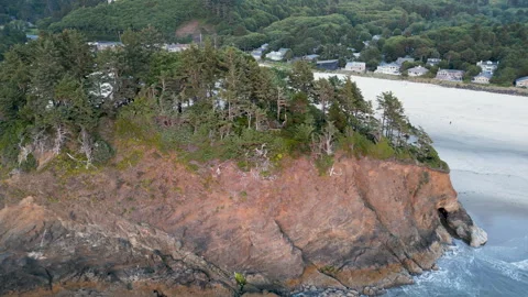 Drone tracking shot of the ocean cliff side of  Proposal rock Stock Footage 249028059