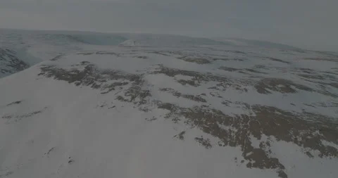 Drone Tracking Shot Over Snowy Mountain, 4K Stock Footage 314403501