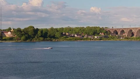 Drone Tracking Shot of Speedboat Approaching the Old Little Belt Bridge in Stock Footage 346662846