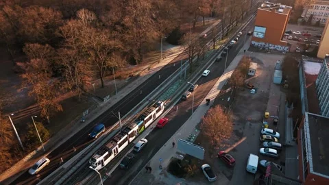 Drone tracking tram sideways in Polish city — 21.01.2026 Stock Footage 327312450