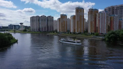 Drone trailing passenger ship on river Vidéo 329268965
