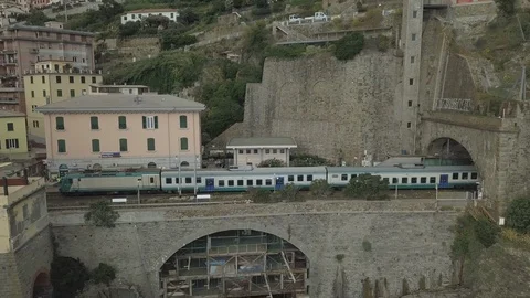 Drone | Train Passing Through a Tunnel | Coastal Italian Town  (No Color Grade) Stock Footage 106795816