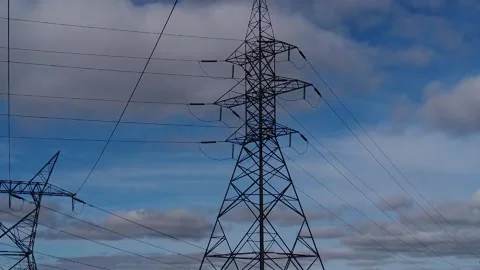 Drone Travels Through High Voltage Electric Tower Stock Footage 169978201