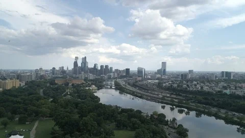 Drone under bridges of schuylkill river with reveal of philadelphia skyline Stock Footage 85253154