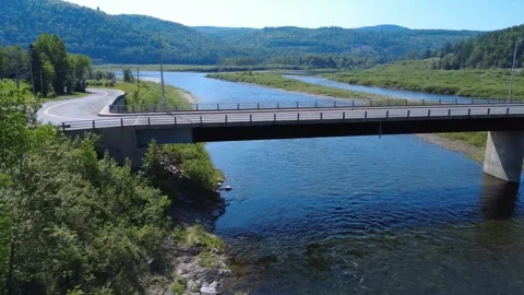 Drone Underpass Flight Beneath a Bridge on the Matapedia Salmon River Stock Footage 341828454