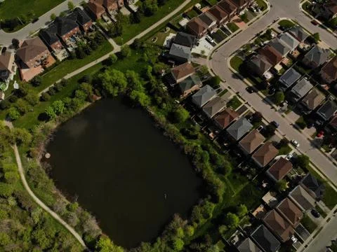 Drone urban cityscape showing lakes and houses Stock Photos