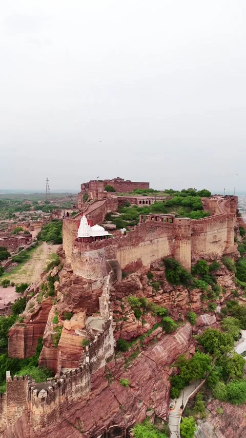Drone vertical shot gliding past Mehrangarh’s carved stone Stock Footage 310660711