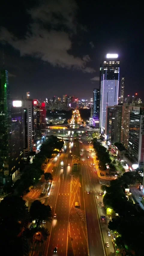 Drone Vertical View of City CBD night, Bustling with traffic, Ambilight, 4K Video stock 252043062