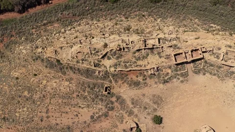 Drone Vertical View of a Desolate Ghost Town with Ruined Stone Buildings and Video stock 333864761