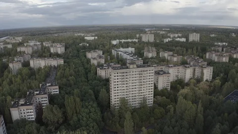 Drone video in an abandoned city of Pripyat in the Chernobyl Stock Footage 128367484