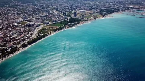 A drone video from above of the beach and the town of Bar in Montenegro Vídeo Stock 315656751
