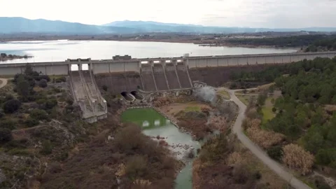 Drone video approaching the gravity dam of Bellus, in Spain Stock Footage 255849910