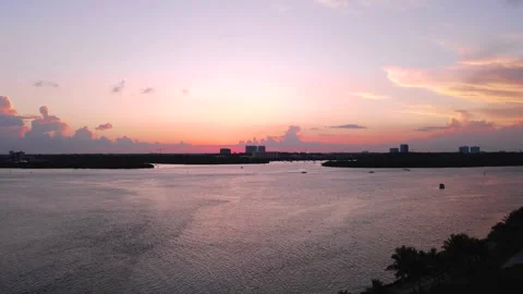 Drone video of Bay and sunset with colorful cloudy sky in Miami, Florida 4k Stock Footage 244005365