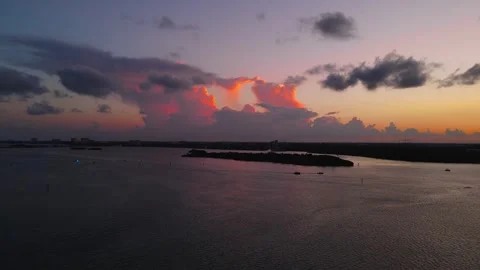 Drone video of Bay and sunset with colorful cloudy sky in Miami, USA 4k Stock Footage 244005372