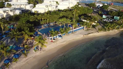 Drone video of beach, pool and resort Stock Footage 260268651