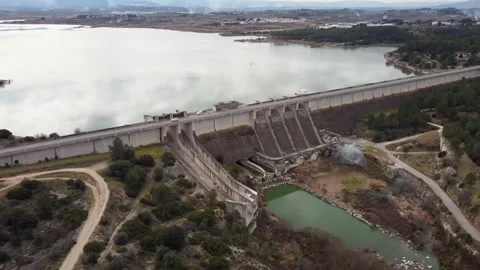 Drone video of the Bells gravity dam for irrigation and water containment Stock Footage 255849686